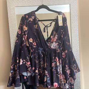 Floral plunge neck romper